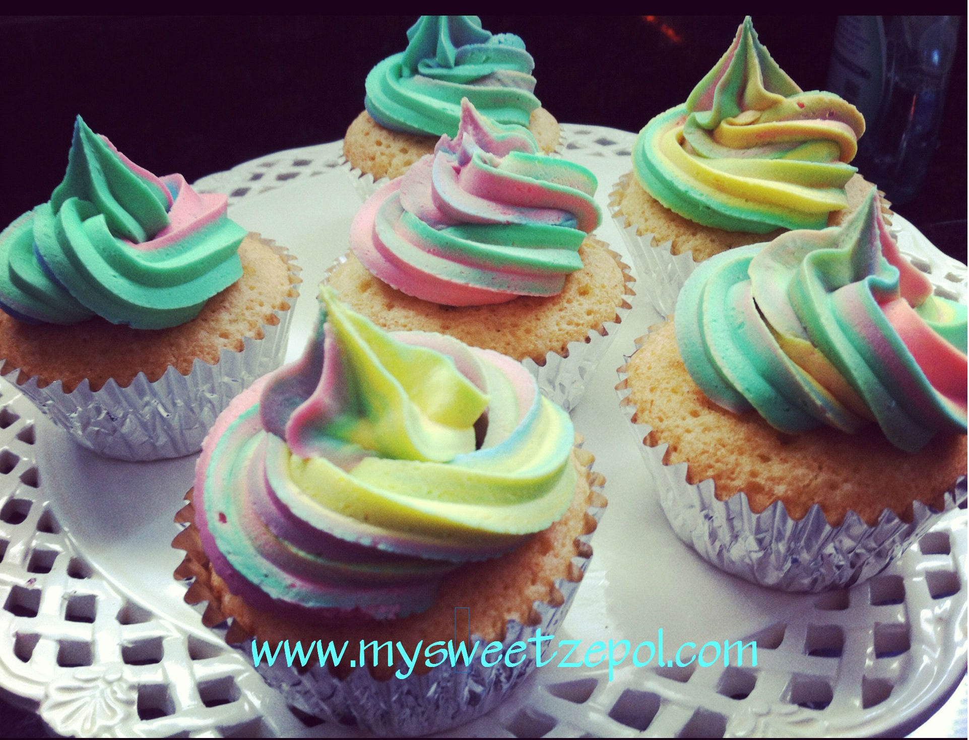 colorful frosting and cupcakes