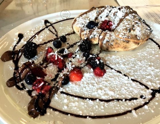 Signature Nutella Calzone with fresh berries from MidiCi The Neapolitan Pizza Company in Central Florida, find more infor at mysweetzepol.com