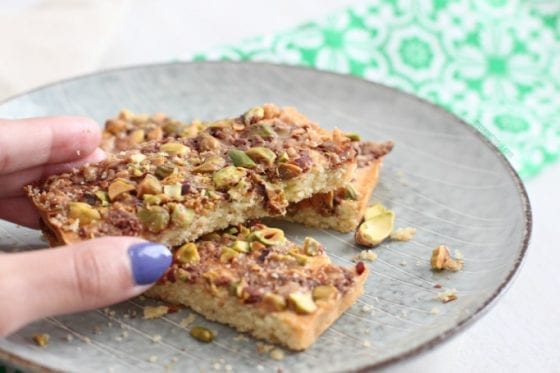 Grab this Pistachios Toffee Shortbread Bars recipe in mysweetzepol.com and make them asap. You'll love how easy they are to make and how amazing this shortbread bars tastes! #shortbread #cookierecipe 