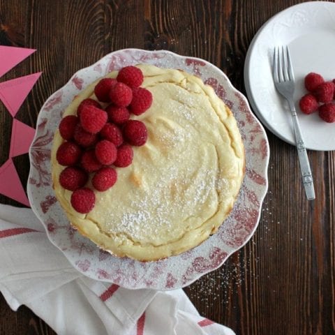 Dairy Free Cheesecake topped with fresh raspberries