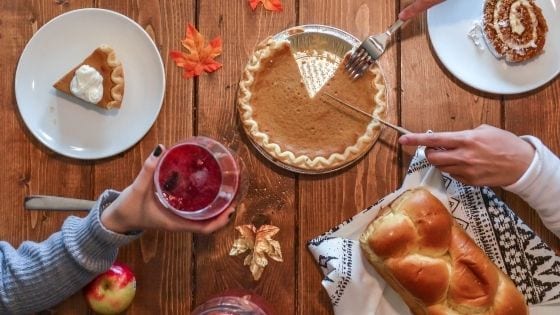 Teenagers can help with desserts during Thanksgiving dinner, table fulled with pumpkin inspired dessert as part of Thanksgiving menu