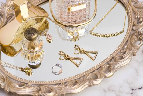 decor tray with a mirror, jewelry, perfumes